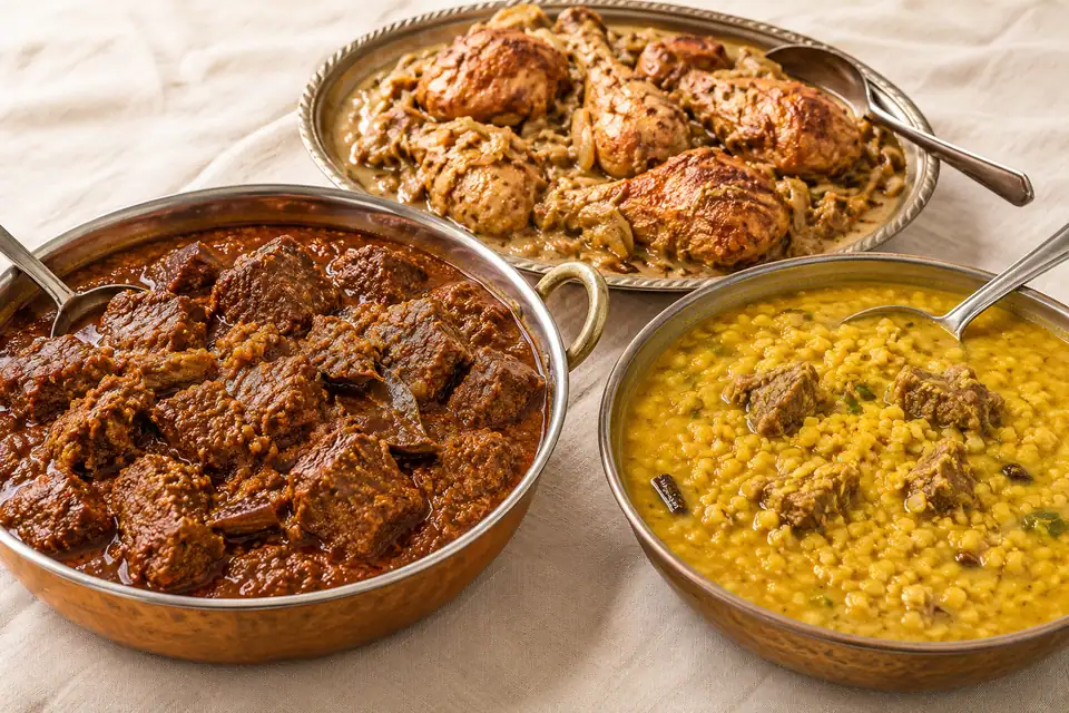 Illustrative Beef Curry, Dal with Goshto, Chicken Roast serving arrangement